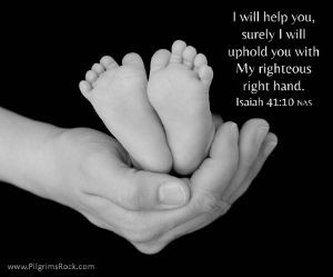 "I will help you, surely I will uphold you with My righteous right hand." Isaiah 41:10 - baby feet held in parent's hand - Pilgrim's Rock