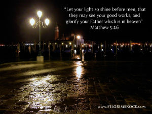 "Let your light so shine before men, that they may see your good works, and glorify your Father which is in heaven." - Matt 5:16 - lamp post on street with reflection on cobblestones