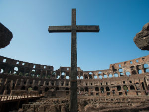 Finding Glory in Pain and Problems Part 1 of 2 - Weekly Blog Post by Dr. Craig Biehl - cross in Roman coliseum