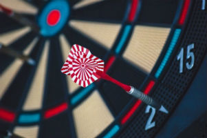 Missing the Mark - Weekly Blog Post by Dr. Craig Biehl - colorful dart board with dart at edge